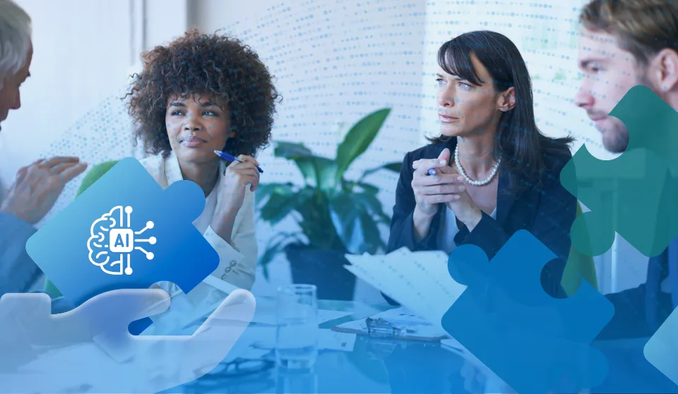 An image that represents the blog's title: Why Giving AI Ownership to IT Alone Is Slowing Your Association’s Adoption. There is a photo of a group of employees around a conference table in a white room, with a plant in the corner. A blue puzzle piece with an AI icon is superimposed in the corner.